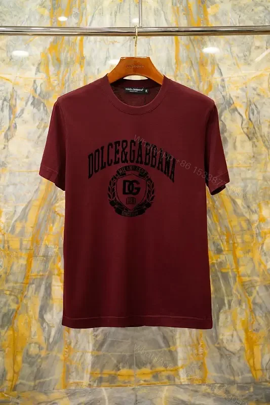 View 1 of Burgundy Short-Sleeve Crewneck T-Shirt with Black Logo Emblem