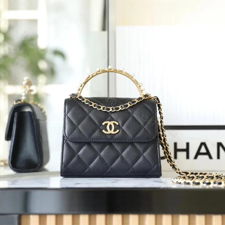 View 1 of Chanel復刻鏈條手拿包23B珍珠手柄黑金款