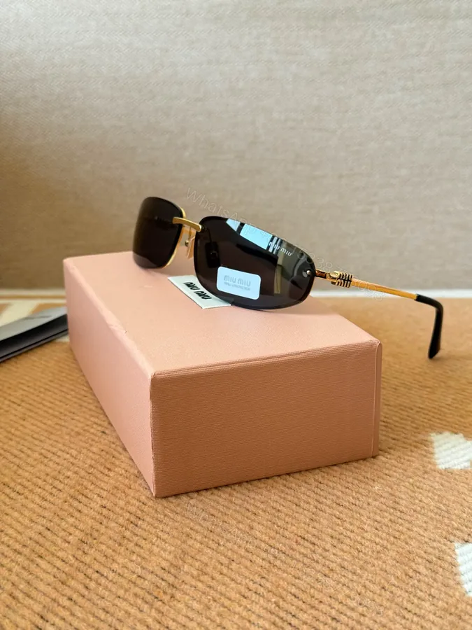 View 1 of Miu Miu Sunglasses Black