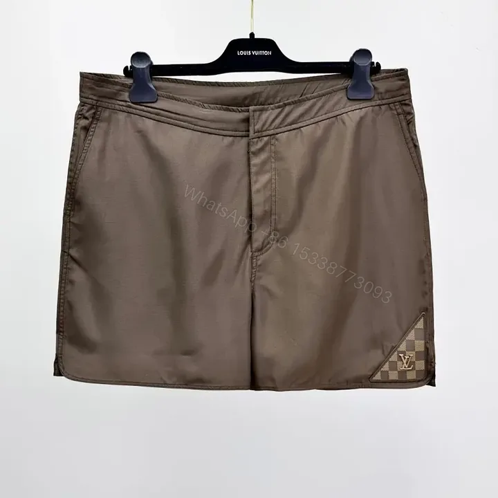View 1 of Brown Nylon Casual Shorts Louis Vuitton Logo Patch Shorts