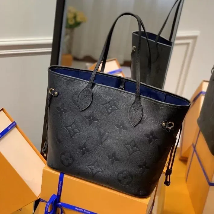 View 1 of LV NEVERFULL MM 32 BLACK EMBOSSED COWHIDE LEATHER