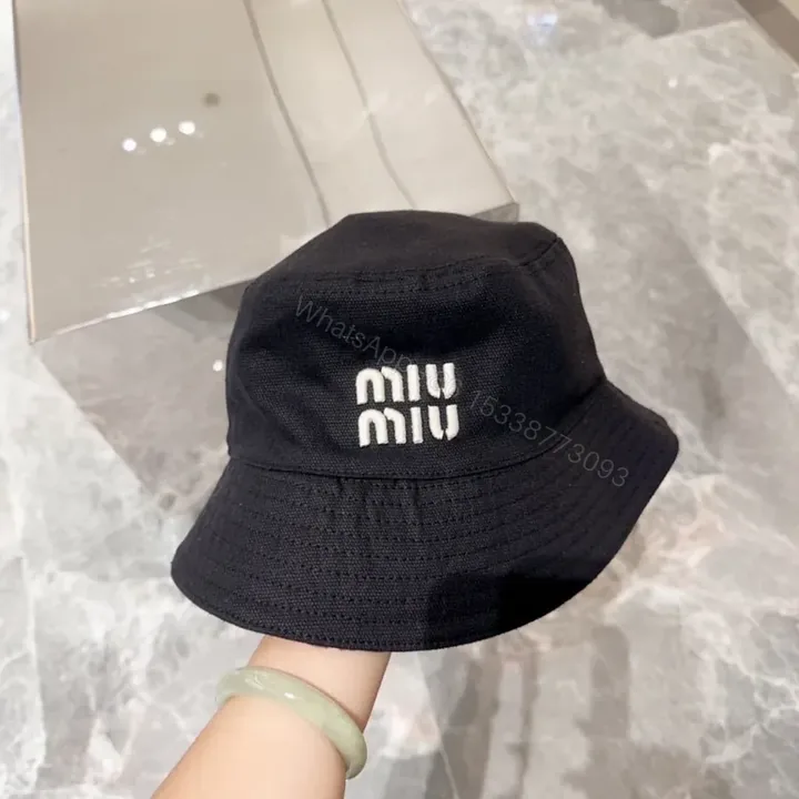 View 1 of Chic Minimalist Miu Miu-Inspired Logo Bucket Hat