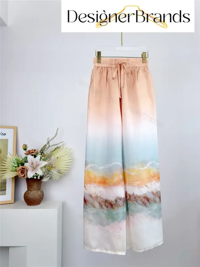View 1 of Zimmermann Daylight Silk Tie-Dye Wide-Leg Pants