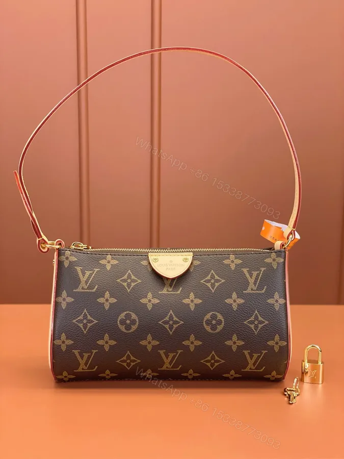 View 1 of Louis Vuitton Pochette Tirette bag in monogram coated canvas