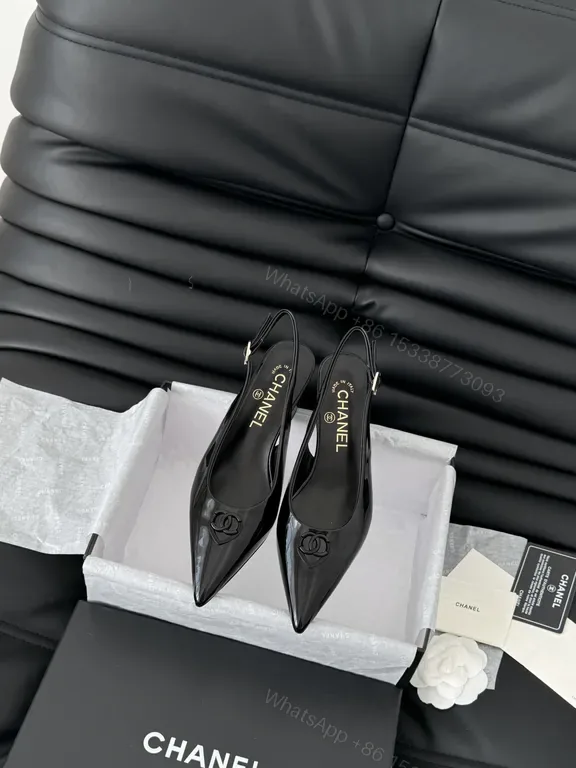 View 1 of Chanel-Inspired Black Patent Slingback Pumps: Sleek Elevation