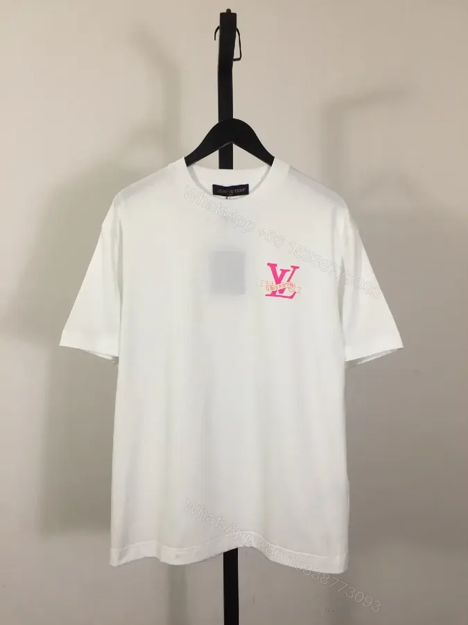 View 1 of White Cotton Tee with Pink LV Emblem – Minimalist Luxe Top