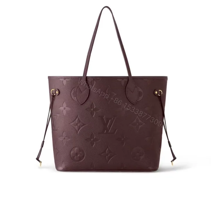 View 1 of Louis Vuitton Neverfull MM Monogram Empreint Wine Red 31Cm M46599