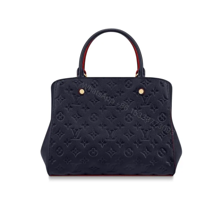 View 1 of Louis Vuitton Montaigne MM Monogram Empreinte Navy Blue 33Cm M42746