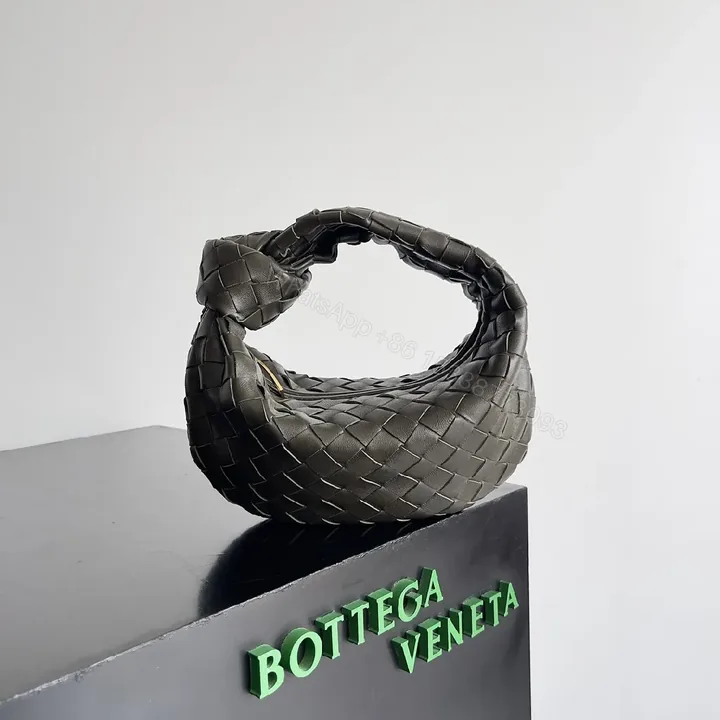 View 1 of Woven Leather Mini Bag: Structured, Compact Luxury Carry