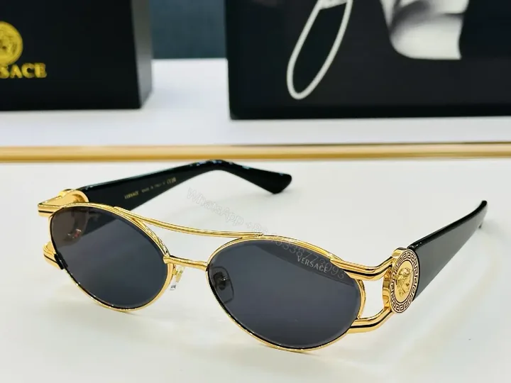 View 1 of Gold-Tone Frame Sunglasses: Luxe Comfort, Bold Attitude