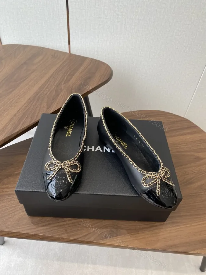 View 1 of Black Leather Ballet Flats with Chain Bow Accent - Luxe Style