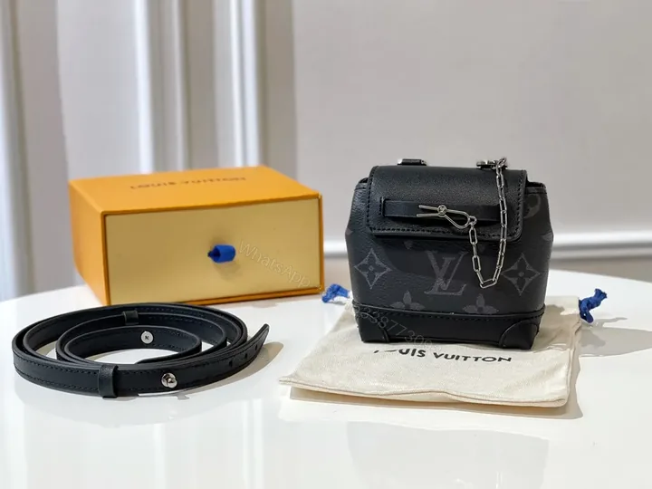 View 1 of Monogram Mini Bag: Compact Luxury Crossbody Bag with Chain