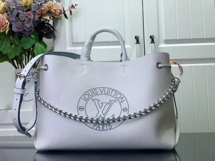View 1 of Pebbled Leather Tote: LV Emblem, Structured, Spacious Carrier