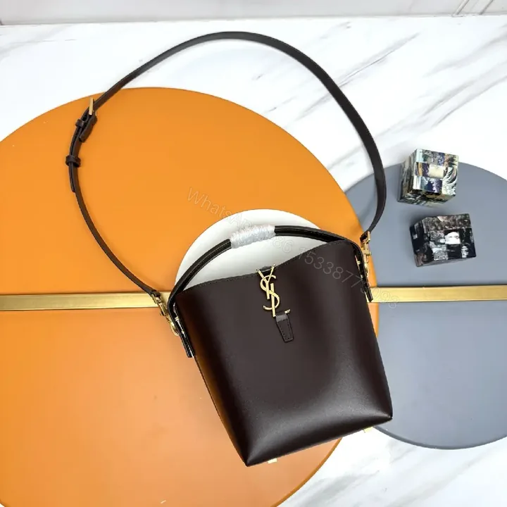 View 1 of Chic Leather Crossbody Bag with Gold Charm - Classic Style