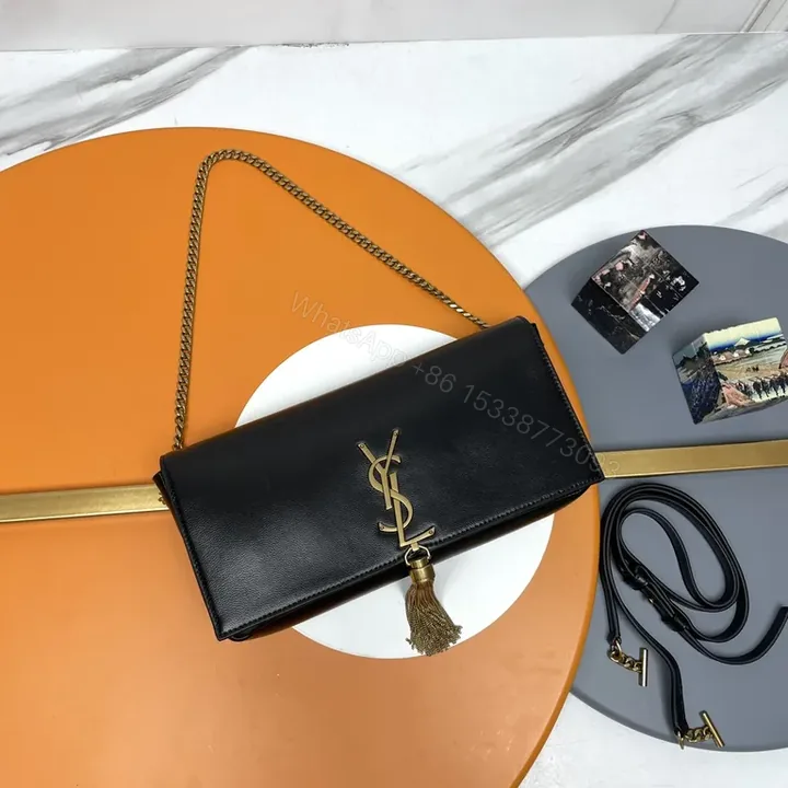 View 1 of Chic Black Leather YSL Tassel Shoulder Bag