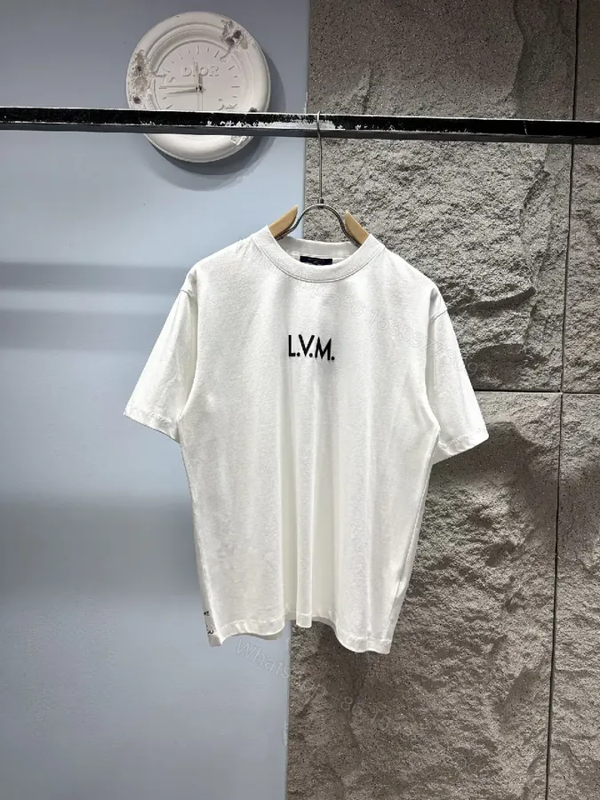 View 1 of Minimalist White T-Shirt with Subtle LV.M Emblem - Premium Cotton