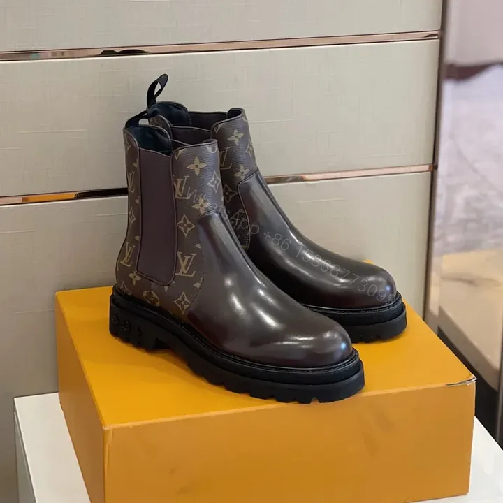 View 1 of Monogram Chelsea Boots: Bold Comfort, Luxury Leather Toe
