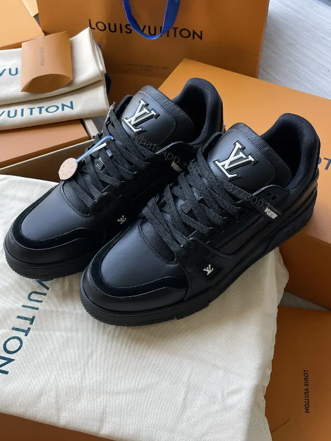 View 1 of Black Leather High‐Top Sneakers with LV Embellishments