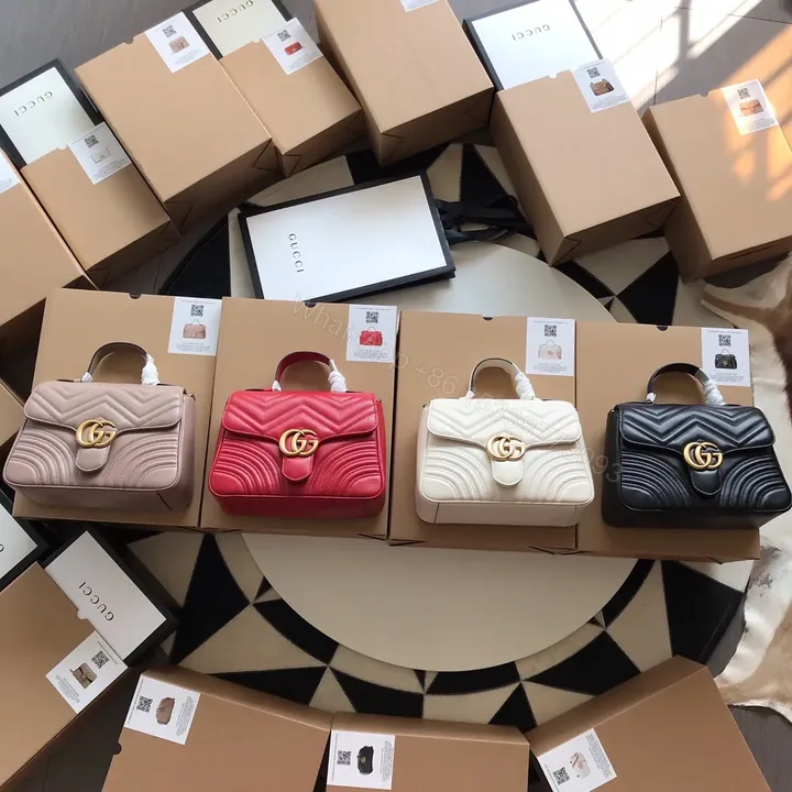 View 1 of GG Marmont Small Top Handle Bag