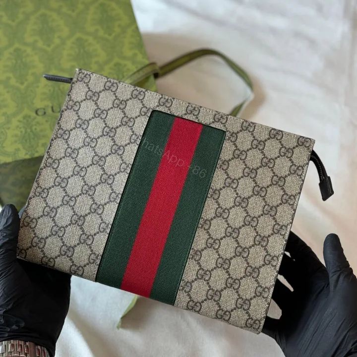 View 1 of GUCCI WEB WRISTLET SUPREME CLUTCH GG