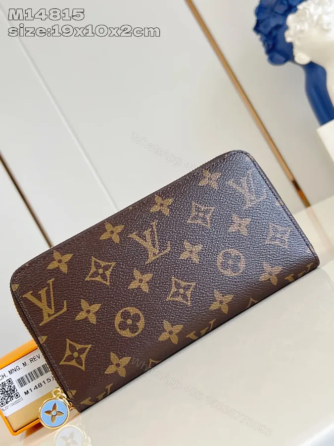 View 1 of Brown Monogram Wallet with Gold-Tone Accent