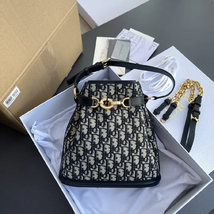 View 1 of Structured Classic Monogram Canvas Bucket Bag with Gold Hardware