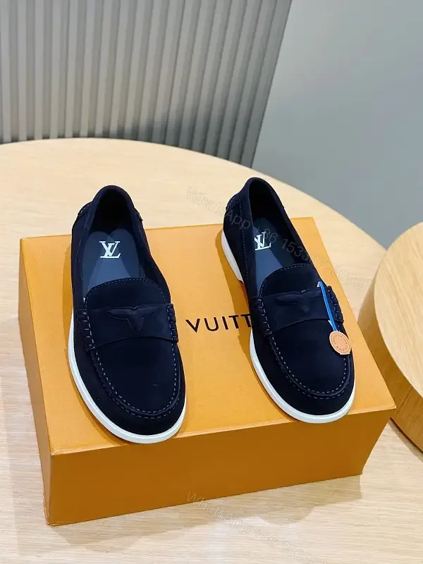 View 1 of Navy suede loafers with white sole for luxury everyday wear