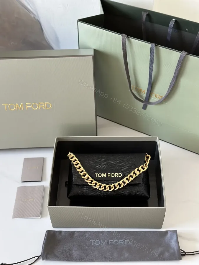 View 1 of Chic Black Leather Wallet with Gold Chain: Luxury, Compact