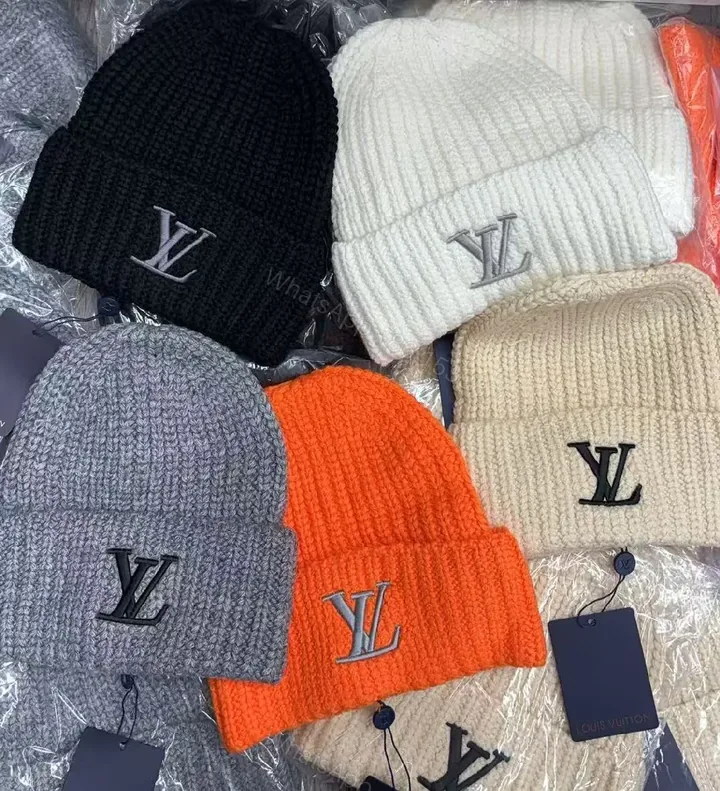 View 1 of Chunky Knit Beanie with LV Logo - Textured Luxury Winter Cap