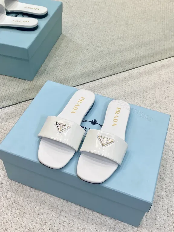 View 1 of Chic White Prada Logo Slide â€” Minimalist Luxury Footwear