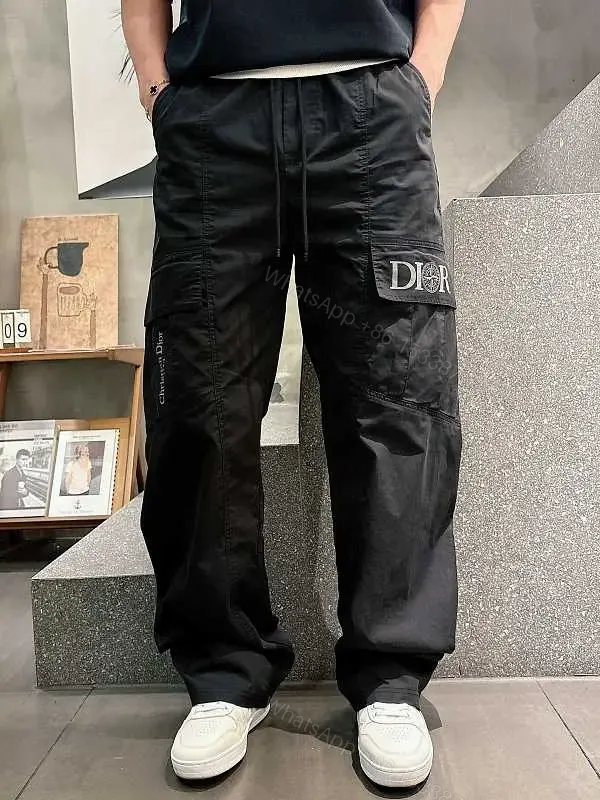 View 1 of Black Cargo Pants - Tactical, Smooth Fabric, Dior Logo Pocket, Relaxed Fit
