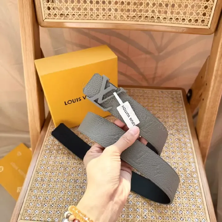 View 1 of Grey Leather Belt: Textured, Subtle Luxe Hardware Belt