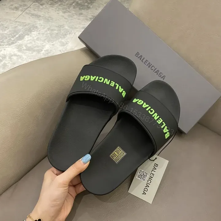 View 1 of Sleek Black Slides: Neon Balenciaga Logo, Allâ€‘Day Comfort