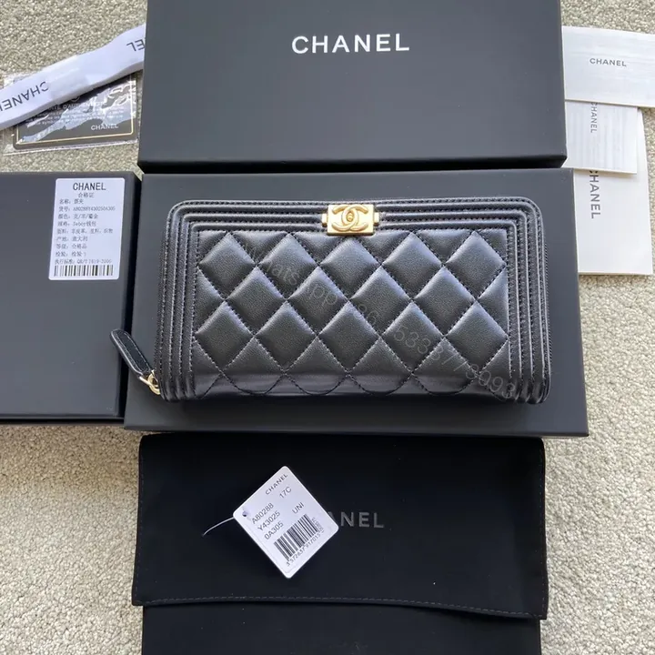 View 1 of Black Quilted Leather Wallet with Gold Chanel Hardware, Slim & Elegant