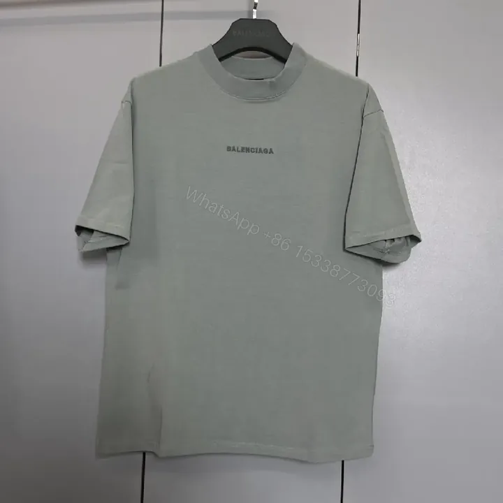 View 1 of Mint Green Minimalist Tee: Soft-Cotton, Refined Logo, Everyday Luxury