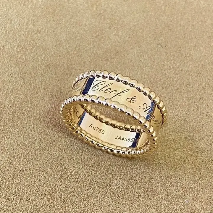 View 1 of 18K Yellow Gold Van Cleef & Arpels Perlée Signature Band Ring