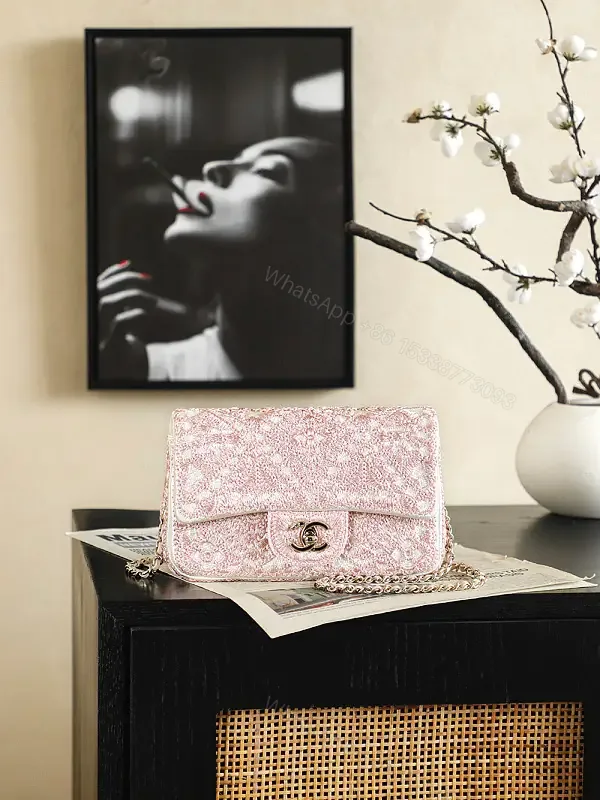 View 1 of pink glitter fabric Chanel-inspired shoulder bag with chain strap for everyday luxury