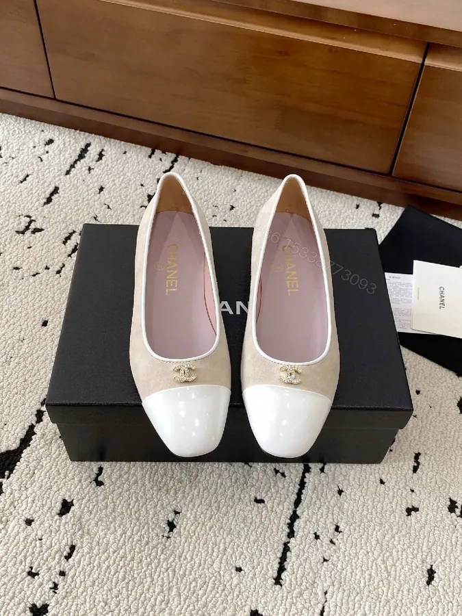 View 1 of Beige Suede Ballet Flats with White Cap Toe and Logo Hardware