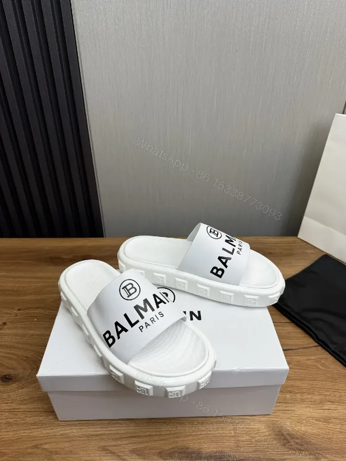 View 1 of White Slip-On with Bold Logo Band, Minimalist Comfort Slide