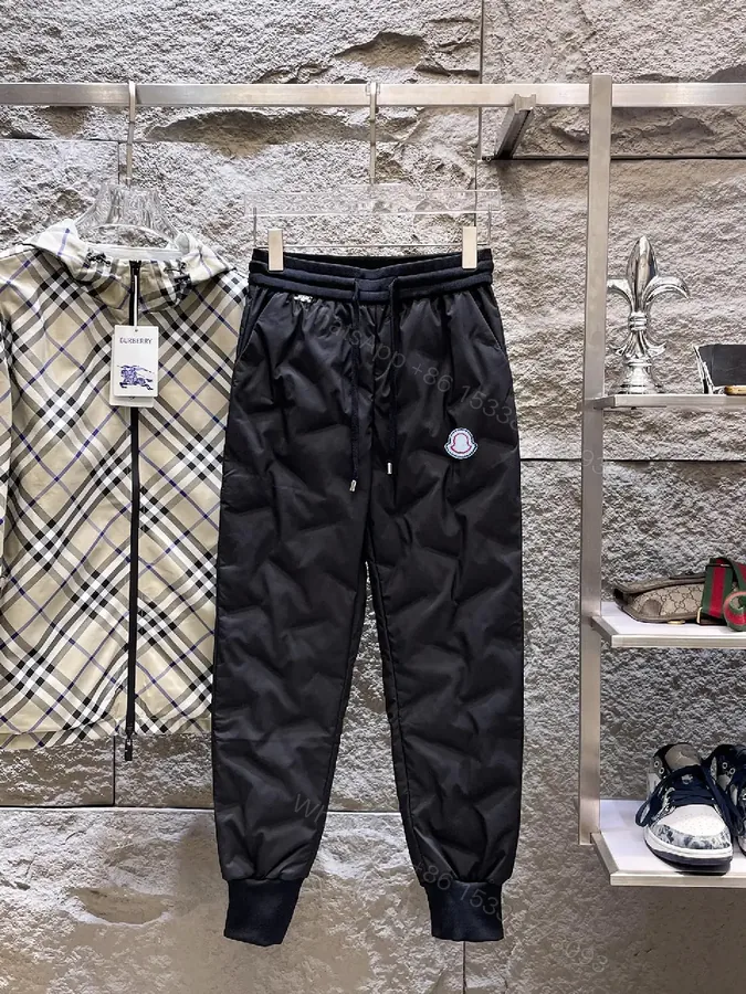 View 1 of Black Nylon Jogger with Subtle Designer Patch, Luxe Streetwear Style
