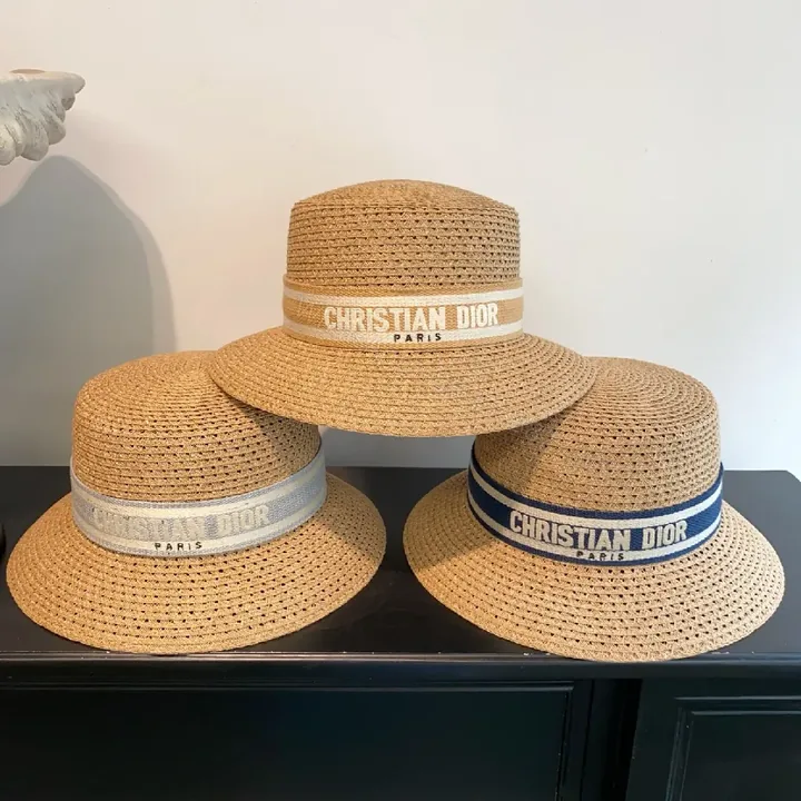 View 1 of Elegant Straw Hat with Dior Band: Effortless Sun-Ready Sophistication