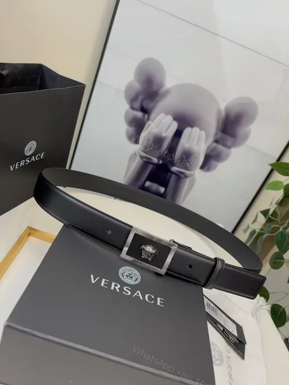 View 1 of Minimalist Leather Belt with Lion Buckle â€“ Versace Luxury Belt