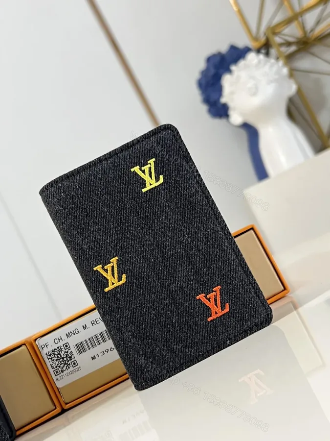 View 1 of Denim Compact Wallet: Embroidered LV-Inspired Accent
