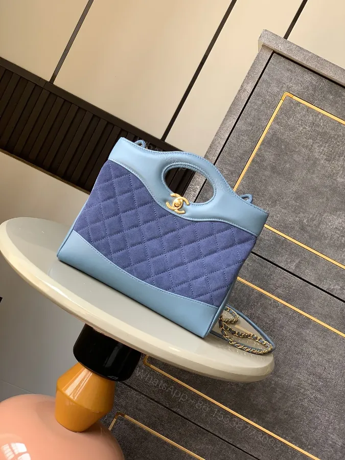 View 1 of Quilted Mint-Blue Tote with Gold Hardware, Chic Style