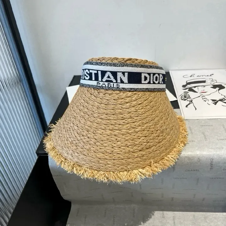 View 1 of Sun-Kissed Straw Visor: Textured Rim, Dior-Style Band