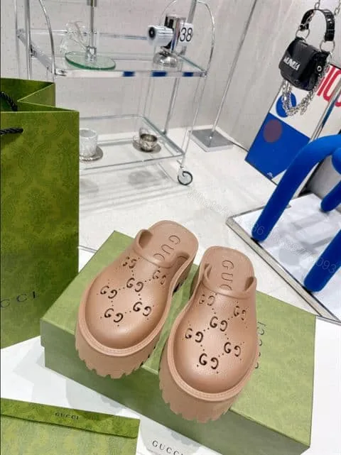 View 1 of GUCCI WONMEN’S PLATFORM PERFORATED G SANDAL – SDG017