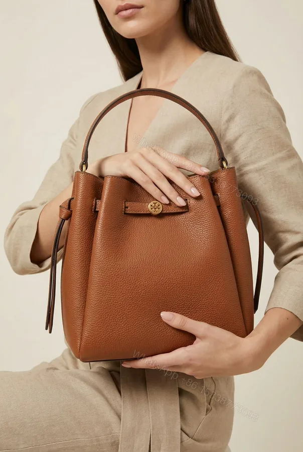 View 1 of Tory Burch Romy Bucket Bag First Copy | AAA+ Replica Designer Bucket Bag