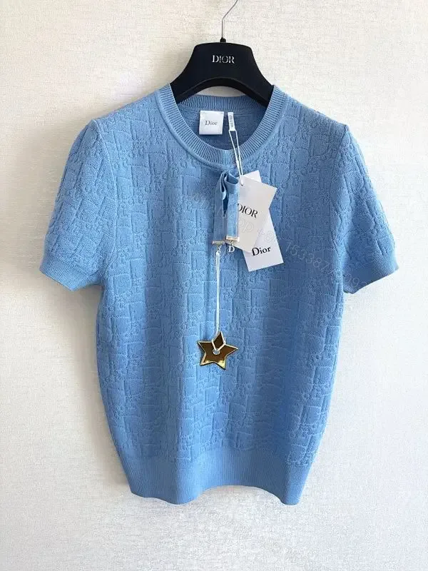 View 1 of Light-Blue Textured Knit Crewneck - Subtle Designer Pattern