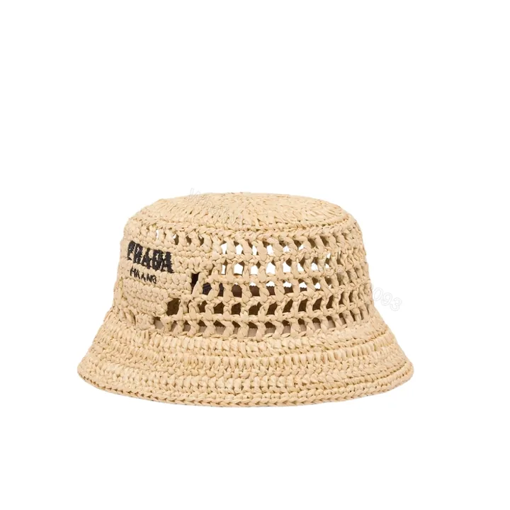 View 1 of Prada Crochet Bucket Hat Raffia Natural