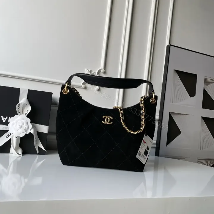 View 1 of Quilted Black Leather Bag with Gold Chain – Luxe Handbag